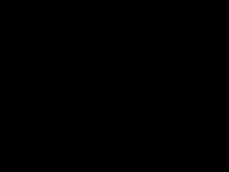En hvit trekant dannes av hjørner som spretter rundt på en svartbakgrunn.