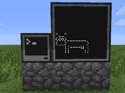 Bilde av en monitor som viser en ASCII ku