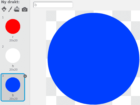 Bilde av en rød, hvit og blå disk i Scratch